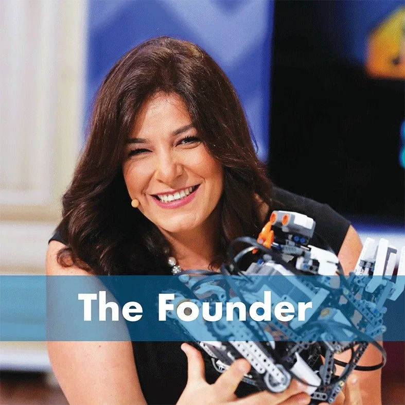 Rana El Chemaitelly, Founder and CEO of The Little Engineer, holding a robotics model